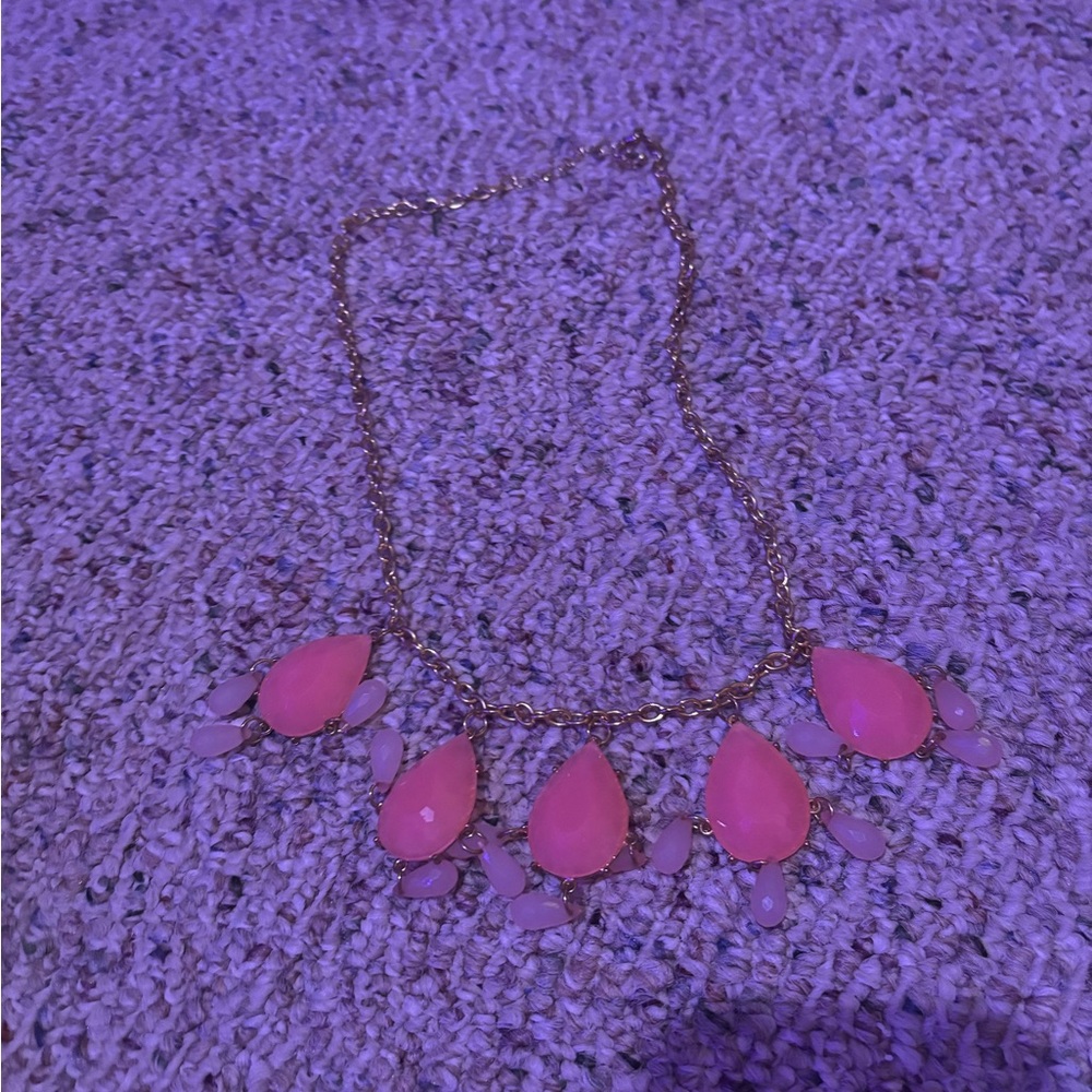 Gold necklace with pink gems